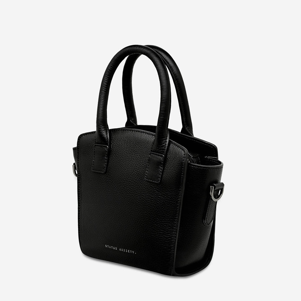 Status Anxiety Worst Behind Us Black